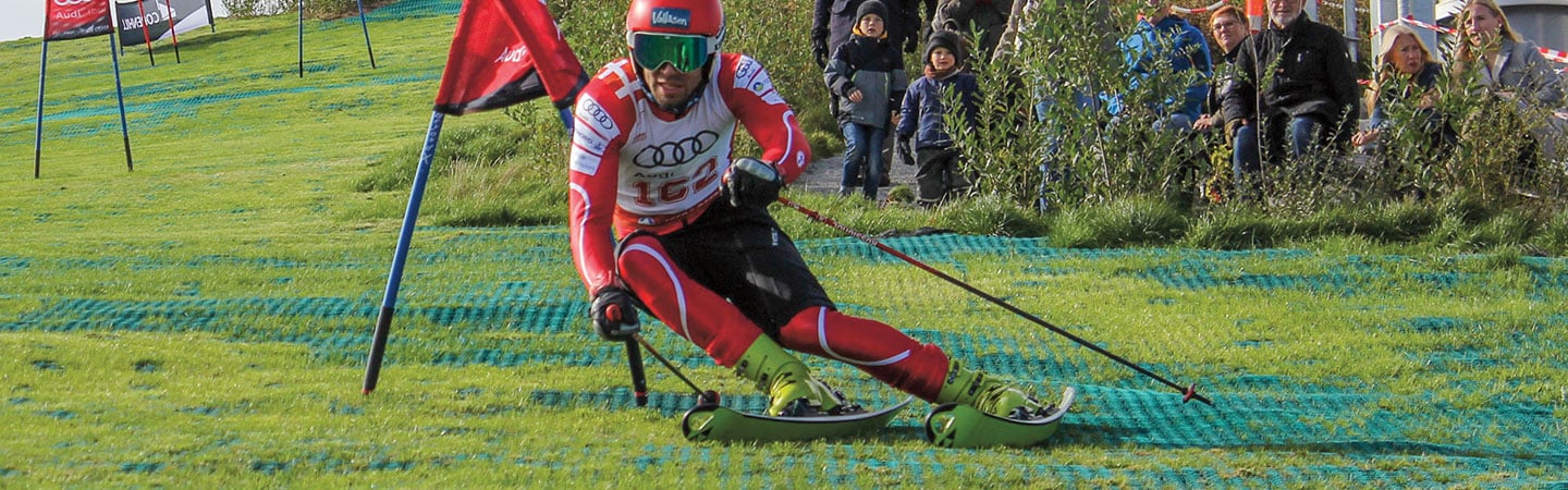 A skier on an artificial ski slope