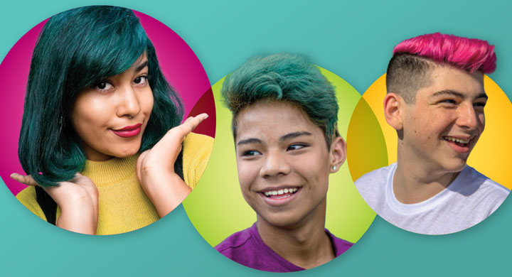 Three teenagers with green, blue, and pink hair