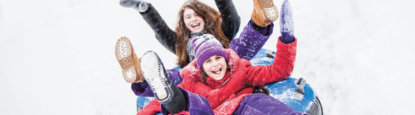 Image of people sledding