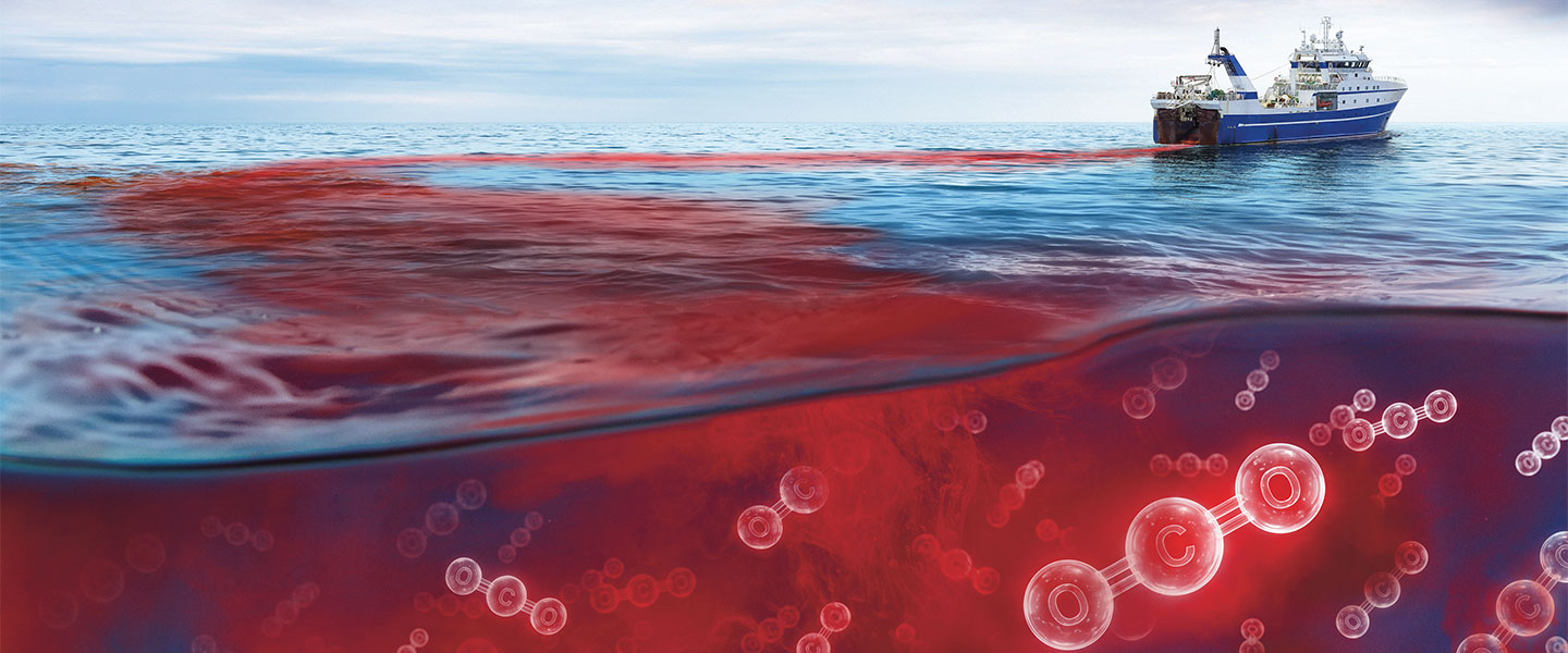 A diagram shows CO2 molecules beneath a red-tinted ocean surface with a research vessel above